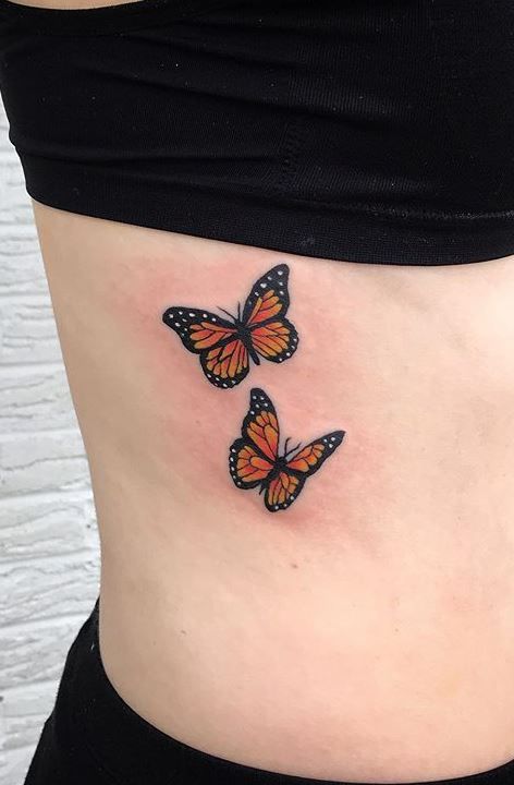 #butterflytattoo #butterflytattoodesigns Two Monarch Butterflies Tattoo, Buterfluffy Tatoos, Small Monarch Butterfly Tattoo, Butterfly Tattoo Monarch, Orange Butterfly Tattoo, Two Butterflies Tattoo, 2 Butterfly Tattoo, Butterfly Tattoo Thigh, Butterfly Tattoo Color