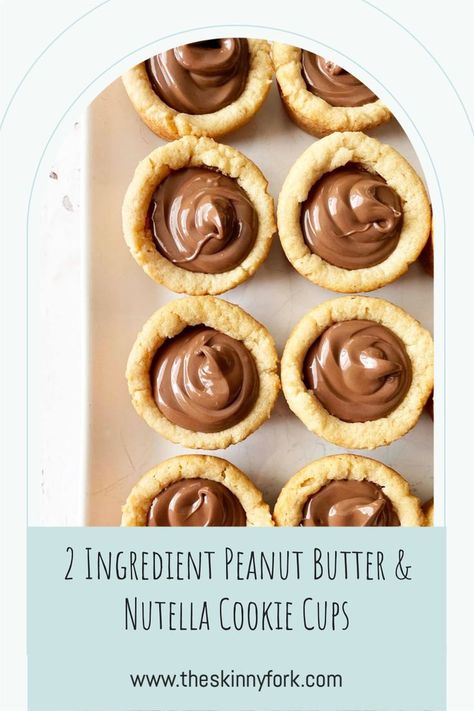 Who wants some 2 Ingredient Peanut Butter & Nutella Cookie Cups? These are easy peasy peanut butter cookie cups that are stuffed with hazelnut spread and perfect to enjoy as a sweet snack! TheSkinnyFork.com | Skinny & Healthy Recipes Nutella Peanut Butter Recipes, Nutella Cookie Cups, Peanut Butter Nutella Cookies, Peanut Butter Cookie Cups, Nutella Cookie, Nutella Recipes Easy, Butter Cookie Dough, Peanut Butter Nutella, Peanut Butter Cookie Dough