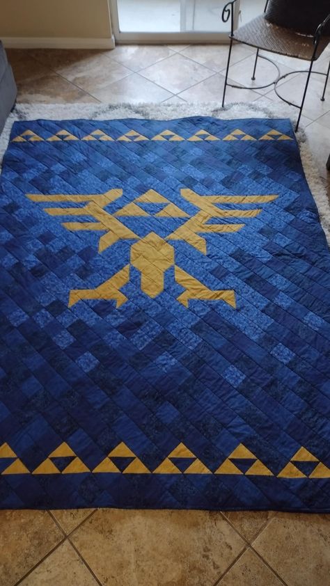 Finished my first quilt!! Made it in my free time as a grad student over the past month. Legend of Zelda theme for my little brother : r/quilting Diy Zelda Crafts, Zelda Quilt, Zelda Pattern, Zelda Diy, First Quilt, My Free Time, Grad Student, Diy Quilt, Little Brother