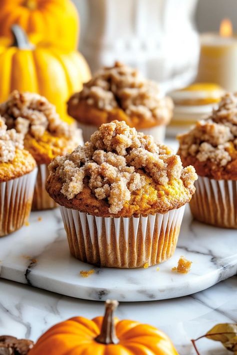 These Pumpkin Streusel Muffins are the perfect combination of moist pumpkin flavor and a crunchy, sweet streusel topping. With every bite, you'll experience a burst of autumn spices and delicious textures, making them an irresistible fall favorite. Don’t miss out on this delicious recipe #pumpkinstreuselmuffins #fallbaking #streuseltopping #pumpkinspice #fallrecipes #muffinrecipes #bestmuffins #bakingseason Breakfast Pumpkin Muffins, Muffin Streusel Topping, Streusel Topping For Muffins, Sweet Cornbread Muffins, Autumn Spices, Pumpkin Cheesecake Muffins, Pumpkin Streusel, Pumpkin Streusel Muffins, Pumpkin Muffin Recipes