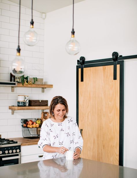 This Waihi home is a lesson in industrial-meets-beach style Industrial Beach Decor, Industrial Coastal, Fish Hoek, Boho Beach House, Wooden Barn Doors, Green Barn, Barn Style Doors, Glass Barn Doors, Beach Cottage Decor