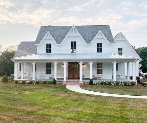 Mitch Ginn on Instagram: "Another popular stock plan of ours - Southern Gothic. This plan is $100 off with code TREAT at our site only through October 31st! Link in bio. Southern Gothic is an open-concept floor plan – great for entertaining. This home features a large formal dining room, main floor master suite with large closet, a large open kitchen to living room concept, and an optional bedroom space in attic area. Outdoor living space is enhanced with a large wrap-around front porch and an Landscaping Around Front Porch, Southern Gothic House, House Wrap Around Porch, Simple Front Yard Landscaping Ideas, White Farmhouse Exterior, Simple Front Yard Landscaping, Simple Front Yard, Victorian Style House, Southern Living House Plans