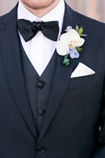 Bow tie and orchid boutonniere Orchid Boutonniere, Blue Boutonniere, Groom Tux, Groomsmen Boutonniere, Hand Bouquet, Boutonniere Wedding, Purple Orchids, Floral Ideas, Courthouse Wedding