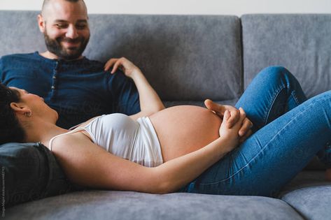 Pregnant Sleep, Men Kissing, Pregnant Woman, Pregnant Belly, Modern Sofa, Pregnant Women, Stock Photography, At Home, Sofa