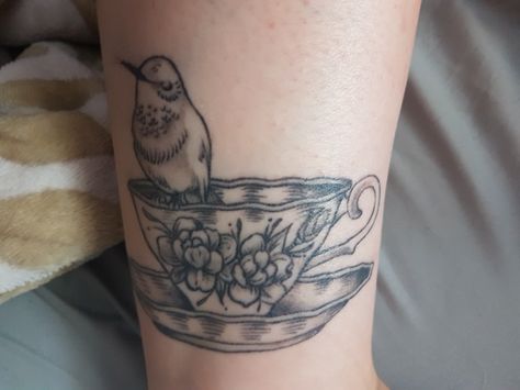 Hummingbird on teacup tattoo Hummingbird Teacup Tattoo, Tea Tattoos, Nan Tattoo, Body Doodles, Hummingbird Tattoos, Tea Tattoo, Teacup Tattoo, Cup Tattoo, Tattoo Time