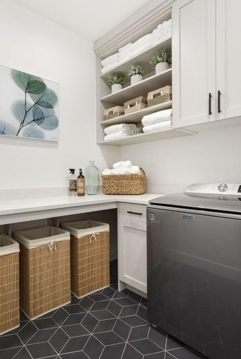 Laundry Room Side Shelves, Storage Closet In Laundry Room, Laundry Room Laundry Basket Organization, Laundry Rooms With Open Shelving, Laundry Room Open Under Counter, Laundry Room Design With Folding Area, Basement Laundry Room And Storage, Laundry Room Baskets Storage, Open Cabinets In Laundry Room