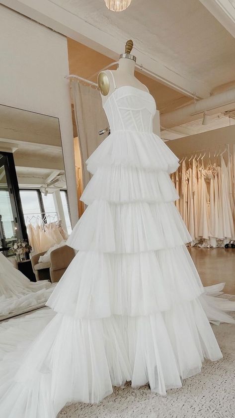 aandbe_bridalshop on Instagram: friday calls for a little drama & this dress is bringing it✨ kahlo by @vagabond_bridal is ready & waiting for our 2023 brides at… Punk Wedding Dress White, White Ruffle Wedding Dress, Layered Tool Wedding Dress, Wedding Dress With Fun Sleeves, Layered White Dress, Layered Wedding Dress Ruffles, Unusual Wedding Dress Unique, Wedding Dress Layers, Tool Wedding Dress