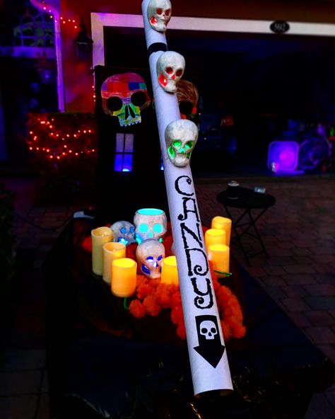 I made thiscamdy slide out of 2 cardboard mailing tubes. A large amazon box and haloween decor i already had. The lettering is vinyl cut on my Silhouette Cameo. It was a hit fir a socially distant halloween. #halloween #candyslide #candyshute Halloween Candy Chute Ideas, Heavy Duty Cardboard Tubes Repurposed, Halloween Candelabra Pool Noodle, Crafts Using Large Cardboard Tubes, Heavy Duty Cardboard Tube Crafts, Cardboard Tube Halloween Craft, Haloween Decor, Haunted Carnival, Amazon Box