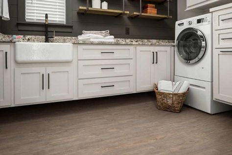 Modern laundry room with wood-look luxury vinyl flooring, white cabinets, and gray shiplap walls Laundry Space, Vinyl Planks, Home Remodel, Laundry Room Makeover, Laundry Room Design, Next Home, Luxury Vinyl Flooring, Luxury Vinyl Plank, Luxury Vinyl