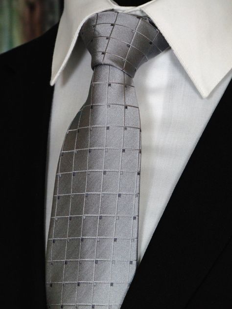 Mens classic silver necktie. This silver tie features a sliver background with a block design. Available as an extra-long necktie. #Silver #Necktie #Gray #Grey #Tile Silver Tie For Formal Occasions, Elegant Silver Suit And Tie Accessories For Black-tie Events, Classic Silver Ties For Wedding, Classic Silver Tie, Classic Gray Tie For Semi-formal Occasions, Silver Tie, Grey Tie, Silver Silk, Broken Arrow