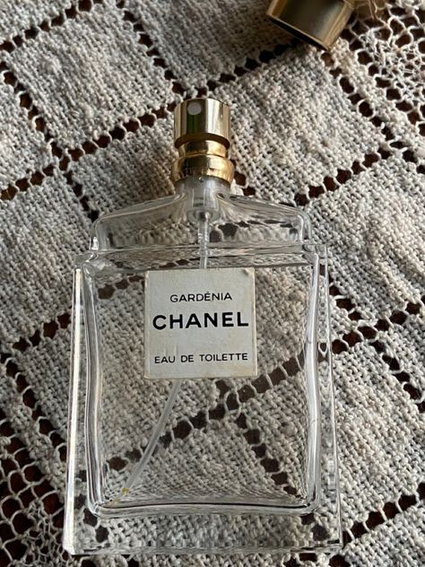 An empty clear glass bottle of Chanel Gardenia spray eau de toilette with cap off Chanel Gardenia, Dior Perfume Bottle, Dior Perfume, Empty Bottles, Perfume Bottle, Love It, Perfume Bottles, My Favorite, Dior