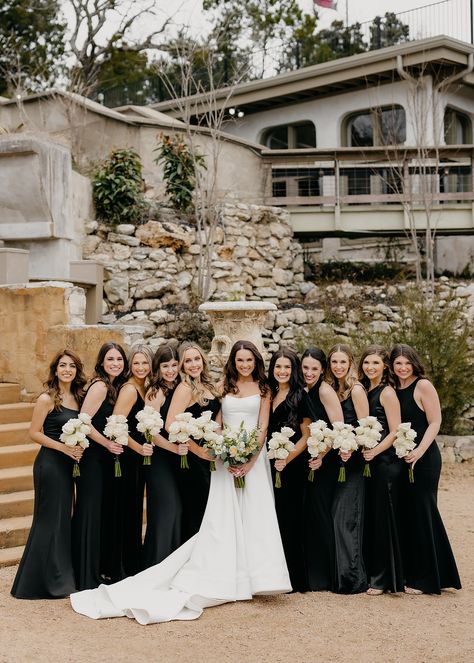 Bridesmaids with bride on wedding day wearing black dresses at Villa Antonio wedding venue in Austin Texas Black Bridesmaid Dress Mismatched, Black Satin Bridesmaid Dress, Villa Antonia, Black Bridesmaid, Fall Bridesmaid Dresses, White Wedding Theme, Bridesmaid Attire, Black Bridesmaids, Mismatched Bridesmaid Dresses