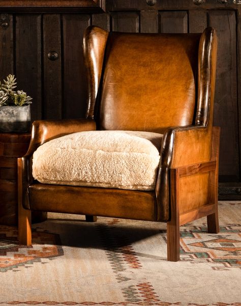 "The Pagosa Leather Chair is a must have! A beautiful exposed Walnut frame with a hand burnish leather and genuine shearling seat cushion. 100% American Made to the highest standards of quality and craftsmanship! Dimensions: 41\" H x 31\" W x 32\" D Arm Height: 24\" Seat Dimensions: 19\" H x 22\" D Leather Description: Artisan Leathers beautifully evoke this time worn quality, unique to every individual piece, like the originals. To pure aniline leather crusts, already fully and carefully uphols Western Living Room, Modern Southwestern, Cabin Furniture, Halfway There, Furniture Details Design, Leather Stool, Leather Accent Chair, Mountain Modern, Leather Artisan