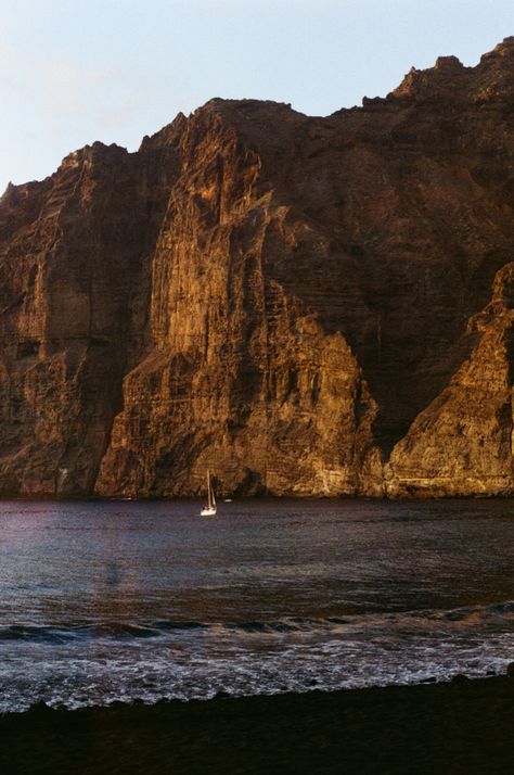 Spain film ohoto 35mm kodak gold fujigilm traveling photo travel blog aesthetic yacht tenerife los gigantes beach sunset sea cliff Tenerife Photo Ideas, Tenerife Aesthetic, Aesthetic Yacht, Blog Aesthetic, Beaches Film, Travel Film, Sea Cliff, Kodak Gold, Sunset Sea