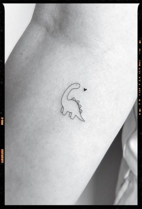 Mini Tattoo #tattooideas #tattoo #creativetattoos #minitats #patchworktattooideas #meaningfultattoos #tattooideasfemale #uniquetattoos Dino Mom Tattoo, Unicorn And Dinosaur Tattoo, Small Trex Dinosaur Tattoo Simple, Dinosaur Line Tattoo, Mini Dinosaur Tattoo, Diplodocus Tattoo, Tiny T-rex Tattoo, Baby Dinosaur Tattoo, Tiny Dino Tattoo