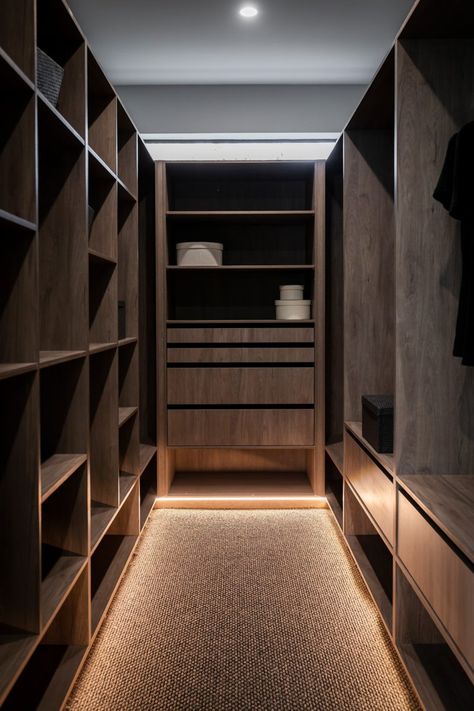 For this walk in wardrobe a woodmatt timber veneer was used, with recessed LED strip lighting. Led Light Walk In Closet, Walk In Wardrobe Lighting, Walk In Wardrobe Design Bedroom, Wardrobe Led Lighting, Walk In Wardrobe Luxury, Walk In Closet Lighting, Closet Led Lighting, Recessed Led Strip Lighting, Wardrobe Lighting Ideas