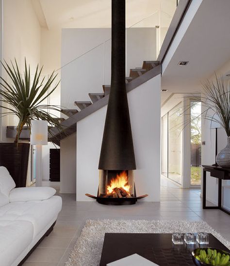 The FilioFocus free-standing fireplace is simple elegance in a fabulous Japanese minimalist style. Designed by Atelier Dominique Imbert, the slim tower of dark steel grows from the floor and... Focus Fireplaces, Design Camino, Standing Fireplace, Design Interior Modern, Fireplace Mantel Designs, Mantel Design, Freestanding Fireplace, Contemporary Fireplace, Renovation Design