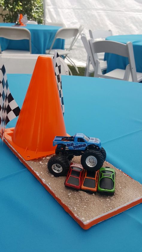 Monster Jam Party Centerpieces, Cars And Monster Trucks Birthday, Monster Truck Birthday Centerpieces, Megladon Monster Truck Birthday Party, Monster Truck Birthday Party Decorations, Monster Truck Pinata, Monster Jam Birthday Party Ideas, Monster Trucks Party, Monster Truck Cookies