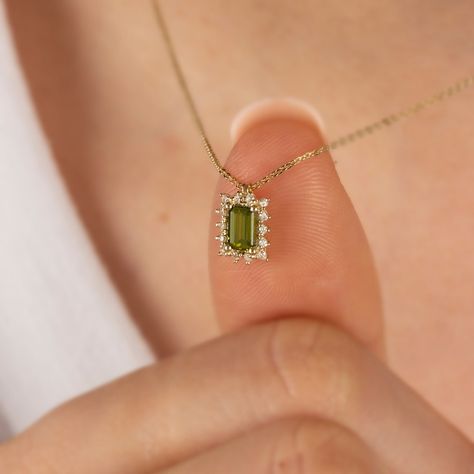 "Peridot stone is a stone that provides access to the body and mind. Positive thinking gives a feeling of optimism. Our Rectangle Peridot necklace surrounded by 14K Solid Gold diamonds is an elegant jewel for you and your loved ones with its elegant design. Time to pamper yourself and your loved ones... Peridot is the birthstone of August. 🤍🤍 Special gifts for your special moments. We produce our jewelery for you in the most perfect way. 🤍🤍 All of our products are made of 14K solid gold and Necklace Rectangle Pendant, Jewelry For Anniversary, Peridot Gold Necklace, Peridot Jewelry Necklaces, Peridot Necklace Gold, Gold Stone Necklace Designs, Minimalistic Necklace, Birthstone Necklace Mothers, August Birthstone Necklace