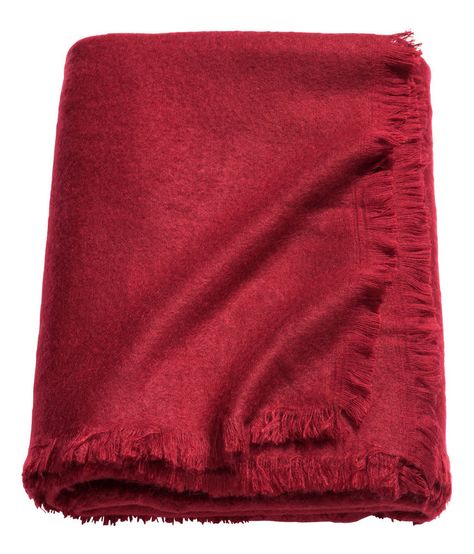 Soft Throw in “Dark Red,” $34.99 H&M Home Red is trending, and for good reason: The bold hue adds a cheery feel that’s sure to liven up any space. Throw this soft blanket over a chair or sofa for a touch of color. Red Throw Blanket, Red Throw, Front Rooms, H&m Home, Pink Decor, Holiday Entertaining, Gifts For Your Mom, Blue Decor, Fringe Trim