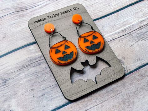 Embrace elegance this spooky season with black cat acrylic earrings designed specifically to add charm and flair to any outfit or celebration beautifully! Shrink Plastic Halloween Earrings, Halloween Acrylic Earrings, Candy Buckets, Shrinky Dink Earrings, Earrings Goth, Scream Halloween, Halloween Baskets, Candy Bucket, Hudson Valley Ny