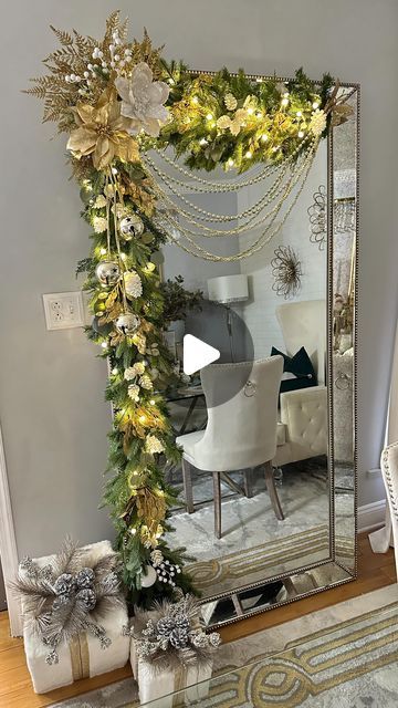 Christmas Mirror Decorations Diy, Bow On Mirror Christmas, Christmas Tree In Front Of Mirror, Christmas Floor Decorations, Christmas Mirror Ideas, Mirror Christmas Decorations, Christmas Garland On Mirror, Mirror Behind Christmas Tree, Christmas Garland Over Mirror