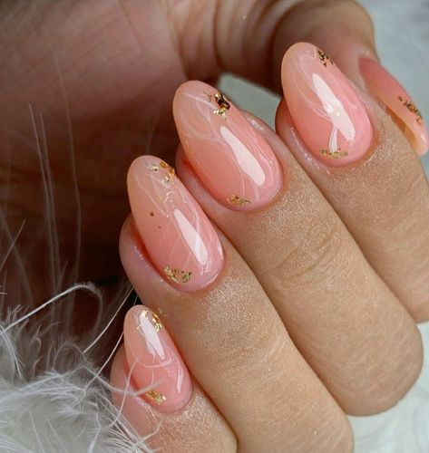 Almond shaped nails. Jelly pink nails, salmon pink nails, light pink nails, peach color nails, jelly pink nails with golden flakes, nails with golden flakes, almond nails with gold flakes, almond pink nails with golden flakes, almond pink nails, glossy nails Gold And Peach Nails, Pink Nails Gold Flakes, Golden Flakes Nails, Pink Glossy Nails, Jelly Pink Nails, Almond Nails Pink, Glossy Nails, Peach Nails, Quartz Nail