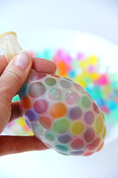 Water Bead Stress Ball - A transparent balloon filled with colorful water beads makes for a soothing and fun kids toy or stress reliever! Market Day Ideas, Kids Market, Diy Fidget Toys, Transparent Balloons, Cool Fidget Toys, Beading For Kids, Easter Decorations Dollar Store, Easter Decorations Kids, Water Beads