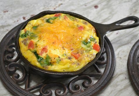 Mini Frittatas loaded with bacon ham, sausage, eggs, cheese, and veggies baked in a mini cast iron skillet. Cast Iron Frittata, Skillet Frittata, Mini Cast Iron Skillet, Small Cast Iron Skillet, Baked Omelette, Mini Frittatas, Mini Cast Iron, Cast Iron Skillet Cooking, Mini Frittata