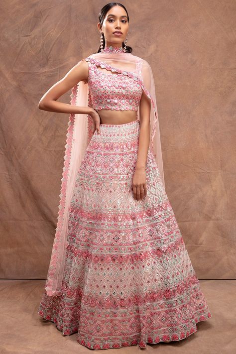 Featuring a blush pink lehenga in net base with foil appliques, thread, and mirrors embroidery. It is paired with a matching blouse and a dupatta.  FIT: Fitted at bust and waist. COMPOSITION: Net. CARE: Dry clean only. Aneesh Agarwaal, Blush Pink Lehenga, Indian Designs, Latest Designer Dresses, Mirror Embroidery, Wedding Lehengas, Net Lehenga, Pink Lehenga, Embroidered Lehenga