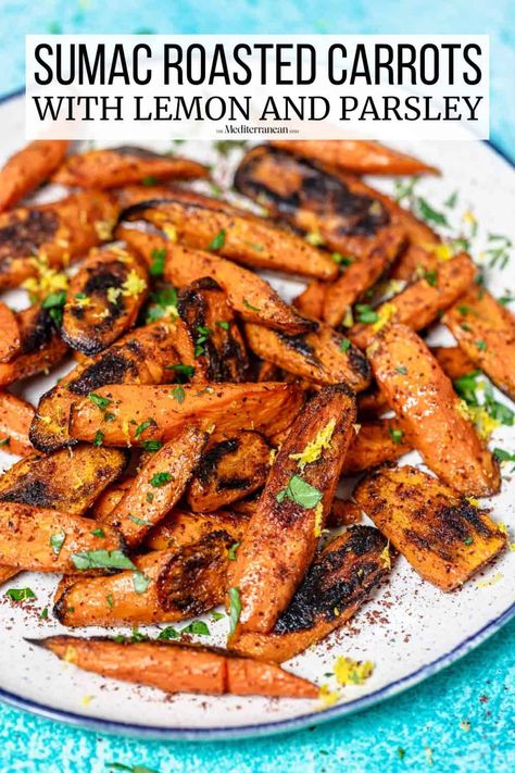 Oven roasted carrots are baked until tender, caramelized, and lightly charred in this easy side recipe. Sumac and lemon zest bring a nice tang to balance the sweetness of the roast carrots. Perfect for weeknights and holidays alike! Mediterranean Apps, Mediterranean Sides, Roasted Carrots With Honey, Carrots With Honey, Veggie Tots, Roast Carrots, Oven Roasted Carrots, Roasted Carrots Recipe, Med Diet