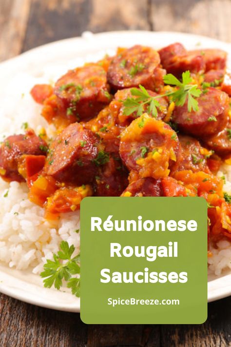 Réunionese Rougail Saucisses This dish is one of the most well-known specialties from the cultural melting pot La Réunion, one of five French oversea regions. Less than 1 Million people live on the small tropical island in the Indian Ocean between Madagascar and Mauritius. Rougail saucisses is made preferably with spicy smoked sausages or chicken. Take a moment to smell the distinctive makrut lime leaves. Smoked Sausages, Lime Leaves, Orange Salad, Reunion Island, Island Food, Andouille, Melting Pot, Smoked Sausage, Fried Onions