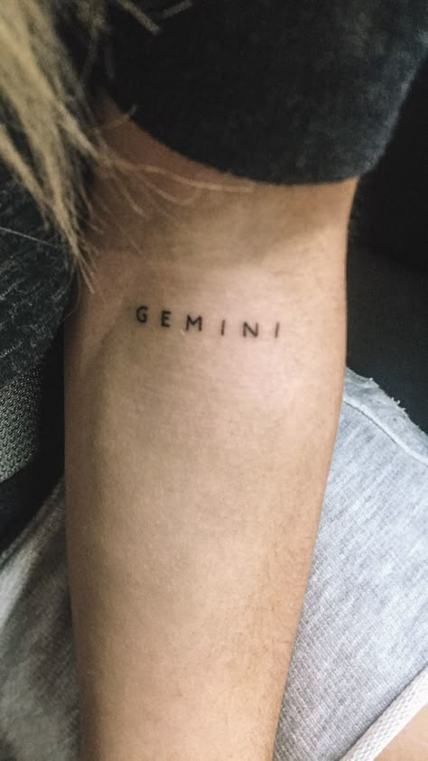 Gemini tattoo Tattoo In Forearm For Men, Gemini Lettering Tattoo, Aesthetic Gemini Tattoo, Gemini Constellation Tattoo Hand, Gemini Tattoos Ideas, Genimi Tattoo Ideas, Mini Gemini Tattoo, Gemini Wrist Tattoo, Gemini Word Tattoo