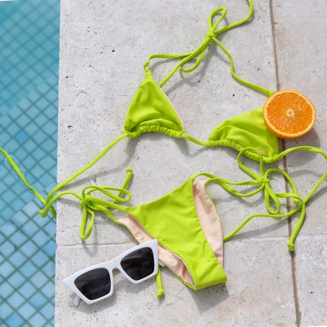 Flatlay of citris coloured neon tie up bikini set by the pool Bathing Suit Product Photography, Flat Lay Swimwear, Swimwear Pool Photoshoot, Nature Moodboard, Colorful Lingerie, Australian Swimwear, Puntarenas, Flatlay Styling, Beach Swimwear