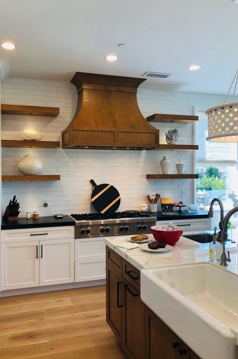 Beautiful stained range hood and floating shelves with contrasting white kitchen cabinets. Floating Shelves By Range Hood, Range Hood And Floating Shelves, Range Hood Shelves, Stove Hood With Open Shelving, Range Hood With Floating Shelves, Open Shelves Above Stove, Hood With Floating Shelves, Barndo House, Small Kitchen Shelf