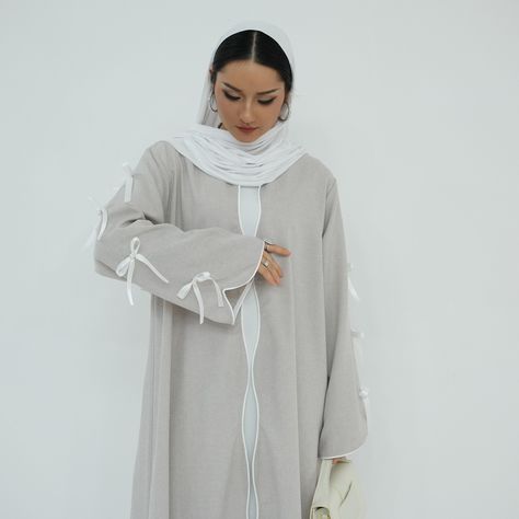 'ATARAH' Bow Knot Open Abaya Available in 3 colors (Blue, Pink and Gray) Shop now: 🔗https://eolanteclothing.com/products/front-open-ribbon-sleeves-abaya-atarah #ootd #modestfashion #eolanteclothing #modeststyle #modestclothing # #instafashion #modestoutfits #elegantmodesty #muslimahfashion #modestvibes #abayastyle #modestfashionblogger #summervibes #summerdress #bowknotabaya #ribbonabaya #openabayas Muslim Evening Dresses, Open Abaya, Dress Muslim, Streetwear Shop, Scarf Sale, Abaya Dress, Formal Dresses For Weddings, Loungewear Women, Luxury Dress