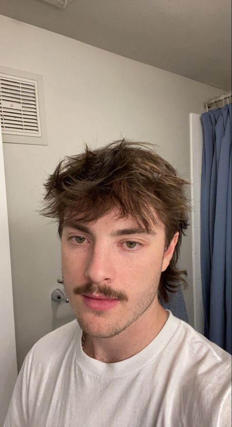 Just a picture of a boy in a white shirt. Mustache And Glasses Men, Guys With Mullets And Mustache, Mullet And Mustache Aesthetic Men, Mustache Men Aesthetic, Indie Mustache, Mullet And Mustache Aesthetic, Boys With Mustache, Guys Mustache, Blonde Moustache