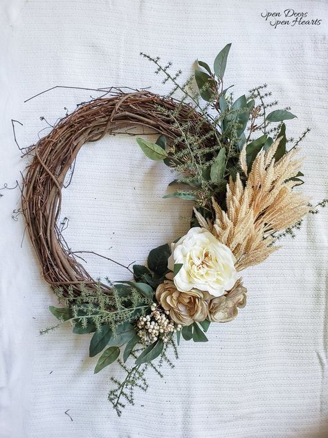 One of my favorite ways to usher in the new seasons is with a new door wreath. This Fall I decided to DIY a neutral Fall pampas grass wreath. If you're new here, go check out Open Doors Open Hearts for more Fall inspiration!Last year I found these fun faux pampas grass stems at my friends' shop.For my Fall decor last year I simply put them all in a vintage bucket and called it good.But this year when I opened my Fall decor totes I felt inspired to put these pretty stems on the front… Pampas Grass Wreath, Faux Pampas, Grass Wreath, Fall Entryway, Floral Balloons, Spring Front Door Wreaths, Wedding Wreaths, Open Doors, Floral Wire