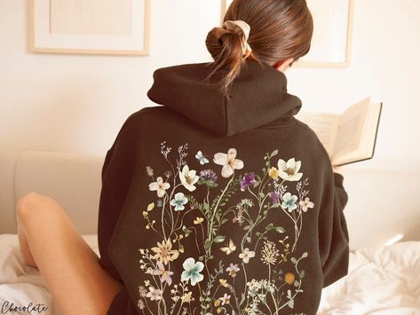 This Gender-Neutral Adult Hoodies item by PoohBearCo has 780 favorites from Etsy shoppers. Ships from United States. Listed on 14 Mar, 2023 Unique Sweatshirt Designs, Hoodie With Flowers, Painting On Hoodies, Hoodie Painting, Cottagecore Hoodie, Painted Hoodie, Pastel Wildflowers, Boho Hoodie, Cottagecore Pastel