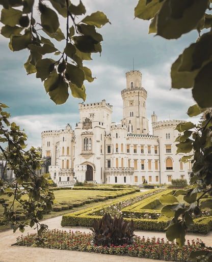 Royal Palace Exterior, Royal Palace Aesthetic, Palace Exterior, Tree Castle, Palace Aesthetic, Exterior Aesthetic, Evergreen Vines, White Castle, Blue Building