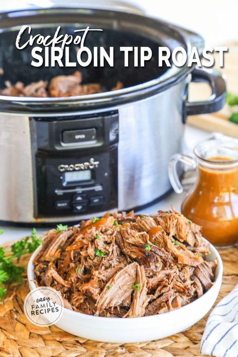 This Crockpot Sirloin Tip Roast is a FAVORITE, whether it’s for a Sunday night dinner or a busy weeknight. The slow cooker makes it easy to transform inexpensive sirloin tip roast into a fall apart tender, juicy cut of beef—you’re not going to believe how flavorful it is! Use the juices from the crockpot to make perfect savory gravy or just serve the roast with au jus for dipping. This is a slow cooker dinner your whole family will love! Slow Cooker Top Sirloin Roast, Sirloin Roast Crock Pot, Crockpot Sirloin Tip Roast, Sirloin Tip Roast Crock Pot, Roast With Au Jus, Beef Sirloin Tip Roast, Pork Sirloin Roast, Beef Roast Crock Pot, Sunday Night Dinner