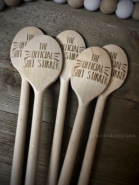 The Official Shit Stirrer Wooden kitchen spoon permanently laser engraved with quote. Makes a great kitchen conversation piece and adds a little humor to the heart of your home. If you're a "wooden spoon surviver" this one's for you! Hilarious gift for the pot stirrer in your life at home or at the office. *this is a novelty decor piece only* *style of spoon may vary based on availability; handle shapes may be different than pictured* All original designs are the property of K Franta Designs and Woodburn Utensils, Driftwood Project, Pot Stirrer, Wooden Engraving, Gift Prank, Artsy Projects, Wooden Spoon Crafts, Wood Burn Spoons, Wood Burning Tips