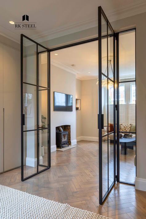 Black Glass Door Living Room, Internal Steel Glass Doors, Glass Doors Between Rooms, Crittal Doors Living Room, Glass Wall Between Kitchen And Living, Internal Room Divider Doors, Internal Glass Doors Living Rooms, Glass Divider Wall Living Rooms, Partition Doors Room Dividers