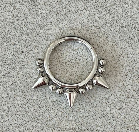 "This septum piercing is made of high quality surgical steel. Piercing \"clicks\" into place. Drop jaws with this body jewelry! Also available in gold and black. Details & Size: ♥ 316L Surgical Steel ♥ 16G, available in 8mm or 10mm size ♥ Every purchase comes with an Elara gift box Please message me if you have any questions" Alt Septum Jewelry, Septum Peicerings, Septum Jewelry Men, Septum Piercing Cute, Cool Septum Jewelry, Bijoux Piercing Septum, Cute Septum Rings, Conch Ring, Septum Piercing Jewelry