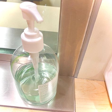 a bottle of greenish-blue hand sanitizer with a white pump nozzle sitting on a desk Sterile Aesthetic, Hospitalcore Aesthetic, Clean Core, Aesthetic Gif, Snow White, Quick Saves, White