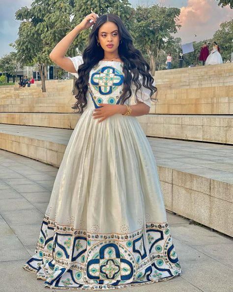 From traditional elegance to modern chic, EthiopianClothing.net has it all! 🌺 Explore the colors, embrace the patterns, and make a statement with our unique pieces. Your wardrobe deserves this upgrade. አዳዲስ ልብስ ለማግኘት ቴሌግራም ቻናላችንን  ይቀላቀሉ፡፡ 👉 https://t.me/menendress ይደውሉልን/መልእክት ይላኩልን +251938057705/ +251913040753 #Ethiopianclothing #habeshakemis #eritreanbeauty #Africanfashion #Eritreans Traditional Maxi Dress With Intricate Embroidery For Ceremonies, Traditional Embellished Floor-length Dress, Traditional Floor-length Maxi Dress With Intricate Embroidery, Ceremonial Navratri Dress With Intricate Embroidery, Ceremonial Dresses With Intricate Embroidery For Eid, Ceremonial Dress With Intricate Embroidery For Navratri, Traditional Dresses With Short Sleeves For Ceremonies, Anarkali Dress For Traditional Ceremonies With Floral Embroidery, Traditional Embellished Gown For Eid