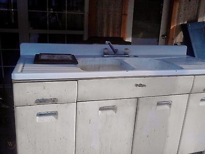 vintage 1950's beauty queen white metal kitchen sink and cabinets | #508492313 Metal Kitchen Cabinets Makeover, Vintage Kitchen Cabinets 1950s, Vintage Metal Kitchen Cabinets, 1950s Kitchen Cabinets, Metal Kitchen Sink, Salvaged Kitchen, Vintage 1950s Kitchen, 1950s Beauty, 1940s Kitchen