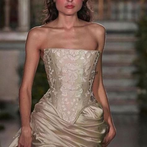 Tina Dimkovska on Instagram: "These @anniesibiza fw24 dresses are just sooo adorable! They give me a modernized version of traditional English wear mixed with Renaissance-inspired embroidery. The corsets are to die for, the draped skirts are brilliant and i mean all the details are on point! I enjoy the way the traditional gowns are transformed in trendy mini dresses. The spider web moment gives me the ultimate couture moment, the lacy maxi gown gives me mob wife, and all the bows give me the perfect cutesy aesthetic. These pieces are just really detailed and interesting to me! And i meannn the styling by @kitty_su is just incredible. This is Annie's third collection and i hope that she keeps consistent with the good work!" Modern Corset Dress, Cutesy Aesthetic, Traditional Gowns, Mob Wife, Maxi Gown, Traditional English, Couture Details, The Spider, Maxi Gowns