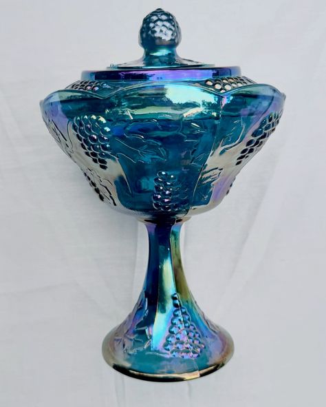 🌊 1978 Vintage Blue Carnival Glass Pedestal Bowl and Lid ~ Indiana Glass Co. $45 + shipping (or local pickup) - #trending #viral #instagram #love #explorepage #explore #instagood #fashion #follow #tiktok #like #photography #glass #trend #instadaily #memes #music #style #trendingnow #antique #foryou #likes #photooftheday #insta #midcentury #vintage #glassware #70s #disco #interiordesign Glass Pedestal Bowl, Blue Carnival Glass, Glass Pedestal, Pedestal Bowl, Follow Tiktok, 70s Disco, Glass Candy, Decor Home Living Room, Indiana Glass