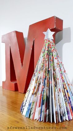 Magazine Christmas Tree, Book Christmas Tree, Old Magazine, Garland Ideas, Flocked Christmas Trees Decorated, Book Tree, Christmas Crafts For Kids To Make, How To Make Christmas Tree, Magazine Crafts